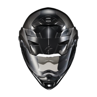 Front view of the Scorpion EXO-AT960 Topographic Modular Adventure Motorcycle Helmet in Black/White. The helmet features a matte black and metallic grey finish with subtle topographic map graphics and white accent details. A clear EverClear® face shield provides wide visibility, while the aerodynamic adventure peak visor, integrated ventilation system, and aggressive chin vent enhance airflow and performance. Designed for adventure touring and dual-sport riding, the EXO-AT960 combines rugged styling, modula