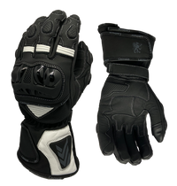 A pair of Gryphon leather motorcycle gloves, predominantly black with white and gray accents, featuring adjustable gauntlet cuffs and TPU knuckle protectors.