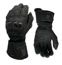 A pair of Gryphon leather motorcycle gloves, predominantly black with white and gray accents, featuring adjustable gauntlet cuffs and TPU knuckle protectors.