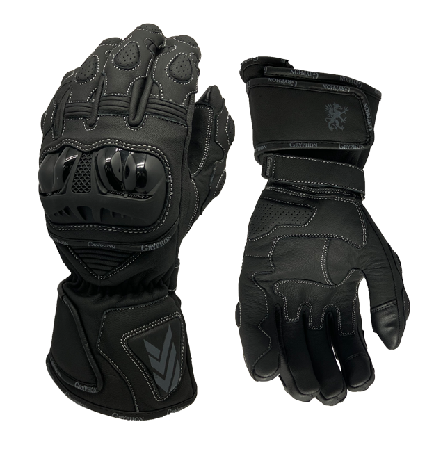 A pair of Gryphon leather motorcycle gloves, predominantly black with white and gray accents, featuring adjustable gauntlet cuffs and TPU knuckle protectors.