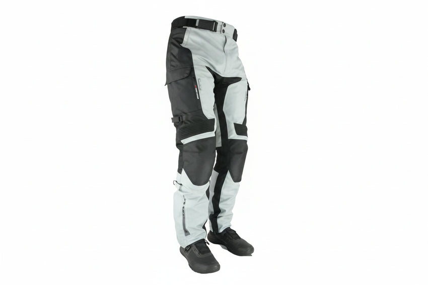 A pair of Gryphon Men's PACIFIC COAST waterproof motorcycle pants in black and gray, featuring knee armor and a belt.