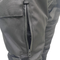 Close-up of the zippered rear mesh ventilation panel and adjustable knee strap on Gryphon Women’s Pacific Coast 2 waterproof motorcycle pants.