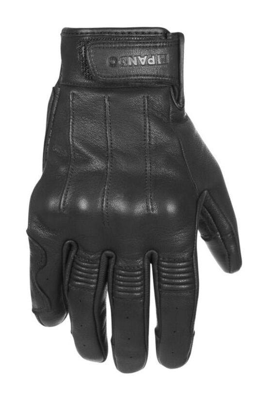 Black leather glove on a white background