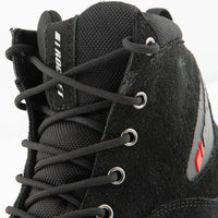 Close-up of the Joe Rocket Blaster Waterproof Motorcycle Shoe highlighting the durable round lace-up closure, reinforced metal eyelets, padded mesh tongue, and premium black suede upper. Designed to provide a secure fit, breathable comfort, and reliable support for commuting, urban riding, and everyday motorcycle use.