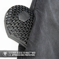 Black knee protector with honeycomb design on a white background