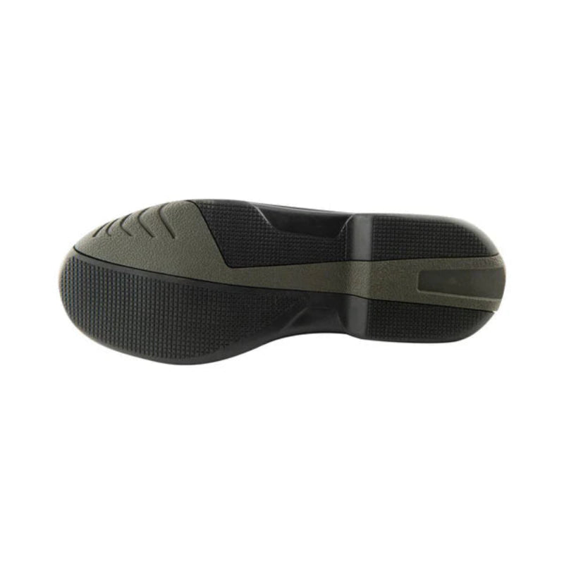 Black and green shoe sole on a white background