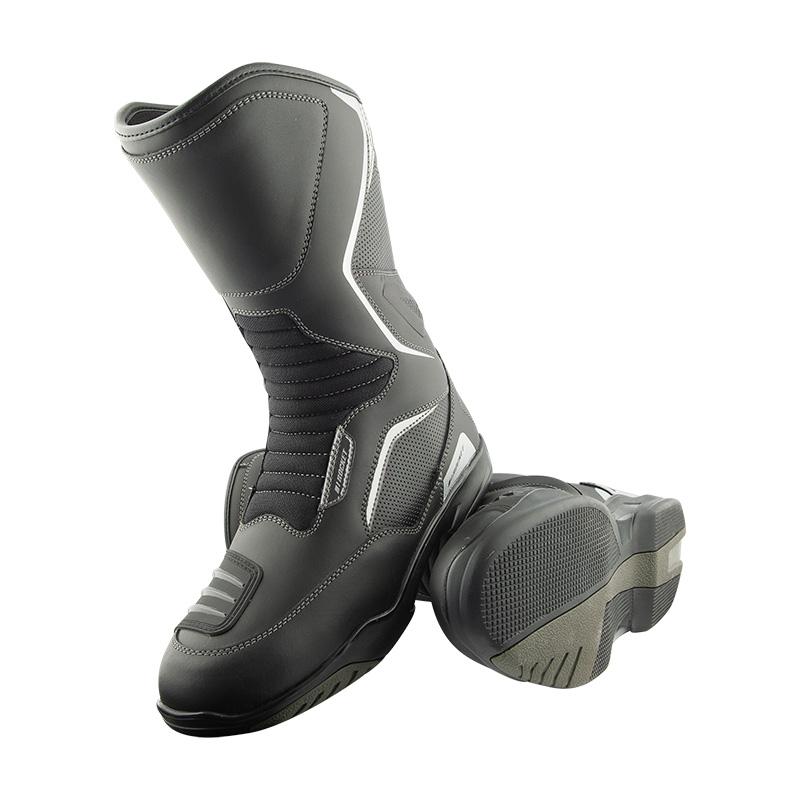 Joe Rocket TransCanada waterproof motorcycle touring boots in black with reinforced toe, heel, and shin protection, flexible accordion stretch panels, reflective details, and a durable anti-slip sole. 