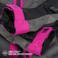 Close-up of a gray and black mesh garment with bright pink hook-and-loop cuff adjusters, labeled as a single-stage cuff adjuster.