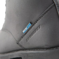 Close-up of the Joe Rocket Iron Age Waterproof Motorcycle Cruiser Boot highlighting the waterproof leather construction and waterproof branding tag. Premium black leather upper provides weather protection, durability, and long-lasting comfort for cruiser, touring, and everyday motorcycle riding.
