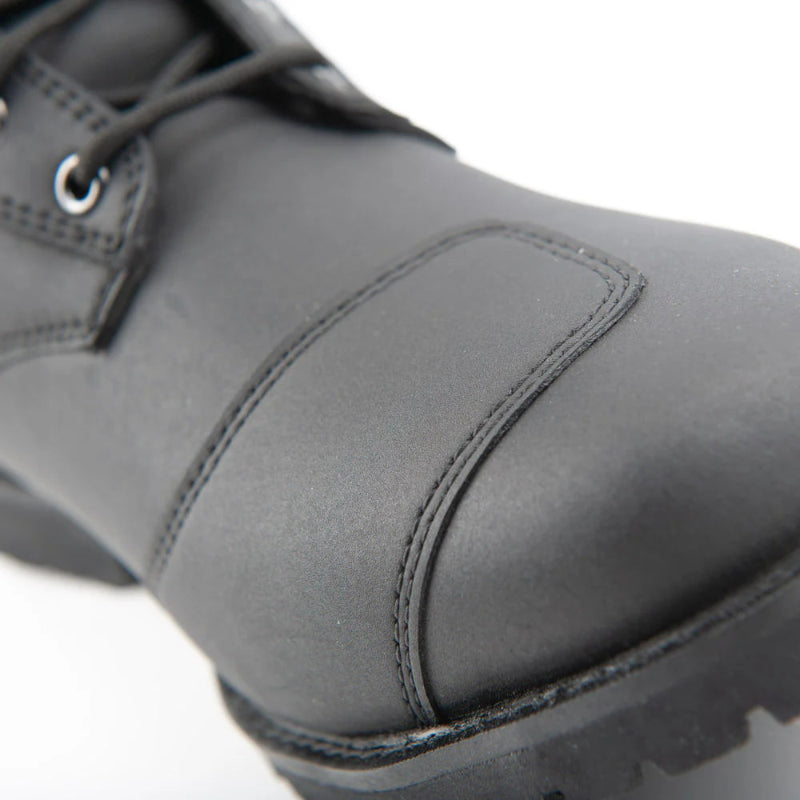 Close-up of the Joe Rocket Iron Age Waterproof Motorcycle Cruiser Boot highlighting the reinforced leather shift pad on the toe. Designed to reduce wear from gear shifting while providing added durability, protection, and comfort for cruiser, touring, and everyday motorcycle riding.