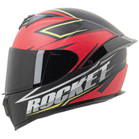 A full face Joe Rocket motorcycle helmet with a black, red, and yellow design, featuring a clear face shield and a rear spoiler.
