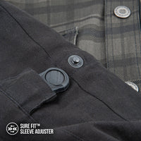 Close-up of the Joe Rocket Richmond™ Armored Motorcycle Shirt's Sure Fit™ sleeve adjuster. The snap-button adjustment system allows riders to customize the sleeve fit for improved comfort, reduced wind flap, and a secure fit over motorcycle armour or base layers. The image also showcases the durable cotton outer sleeve and premium construction details.