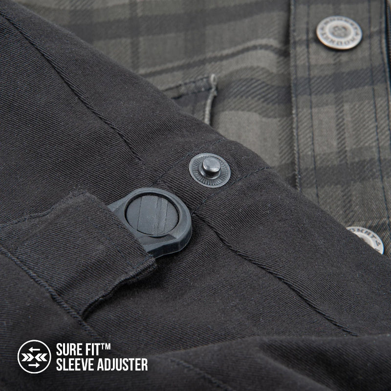 Close-up of the Joe Rocket Richmond™ Armored Motorcycle Shirt's Sure Fit™ sleeve adjuster. The snap-button adjustment system allows riders to customize the sleeve fit for improved comfort, reduced wind flap, and a secure fit over motorcycle armour or base layers. The image also showcases the durable cotton outer sleeve and premium construction details.