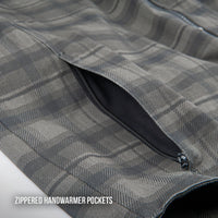 Close-up of the Joe Rocket Richmond™ Armored Motorcycle Shirt's zippered handwarmer pocket. The discreet side-entry pocket is integrated into the plaid cotton outer shell, providing secure storage for essentials while keeping hands warm during cooler rides. Durable construction and a concealed zipper maintain the shirt's clean, casual appearance.