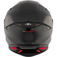 Rear view of the KYT TT-Revo full-face motorcycle helmet in Matte Black with an aerodynamic shell, integrated rear exhaust ventilation, lightweight construction, and race-inspired styling. DOT and ECE certified sport bike helmet engineered for optimal airflow, comfort, and protection on the street and track.