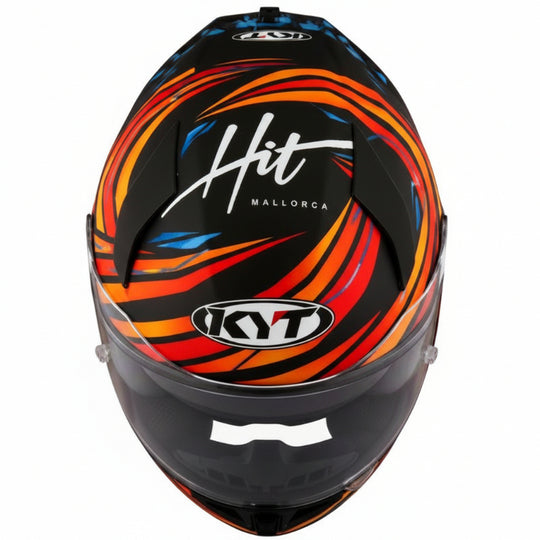 Colorful motorcycle helmet with 'Hit Mallorca' and 'KYT' branding on a white background