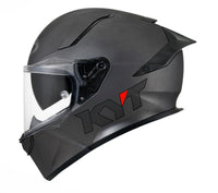 Gunmetal grey motorcycle helmet with clear visor on a white background