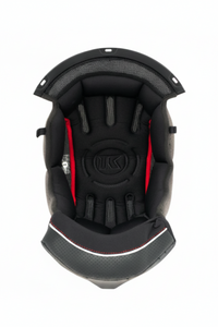 Black and red helmet interior with a visible brand logo on a white background