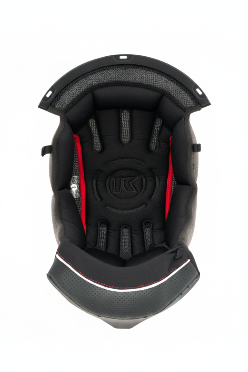 Black and red helmet interior with a visible brand logo on a white background