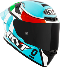 Colorful KYT TT Revo Leopard Replica motorcycle helmet right side view with branding on a white background