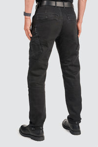 Black cargo motorcycle pants backside worn by a person on a white background