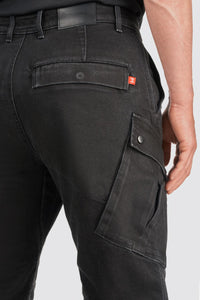 Black cargo pants with a visible brand logo on a light gray background