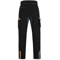 Rear view of the MotoGirl Vanessa Women's Motorcycle Pants in black, featuring a durable abrasion-resistant construction with a full rear jacket connection zipper, reinforced stretch seat panel, two rear pockets including a waterproof zip pocket, large cargo pockets with reflective orange accents, and adjustable lower leg closures for a secure fit over motorcycle boots. Designed for adventure touring, commuting, and long-distance riding with comfort, protection, and all-weather performance.