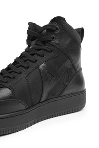 Pando Motor branded Apex lack high-top sneaker close up side view on a white background
