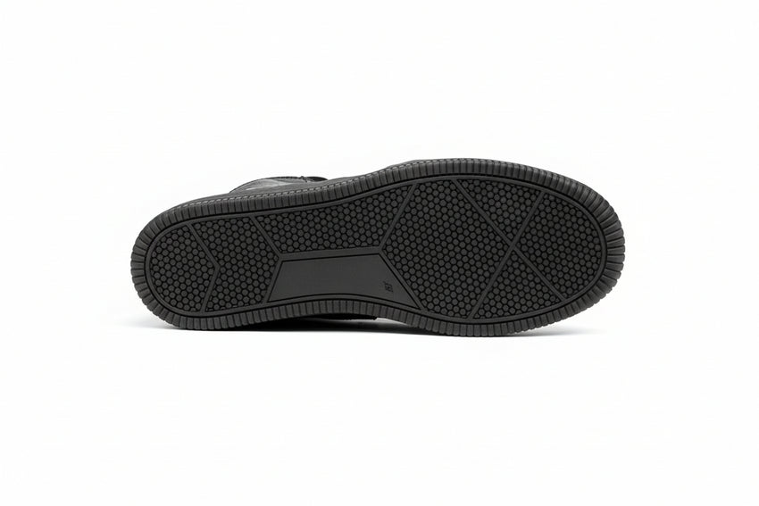 Pando Moto branded Apex black sneaker sole on a white background