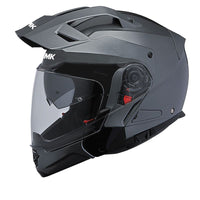 Grey modular motorcycle helmet with a clear visor and ventilation system