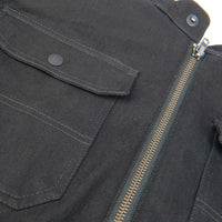 Close-up of a black jacket with a zipper and pocket