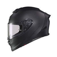 Scorpion EXO-R1 Air Carbon full-face motorcycle helmet in matte black carbon fiber, shown from the side with a clear visor, aerodynamic rear spoiler, advanced ventilation, and ultra-lightweight carbon fiber shell. Premium DOT and ECE certified sport bike helmet designed for high-performance street and track riding. 