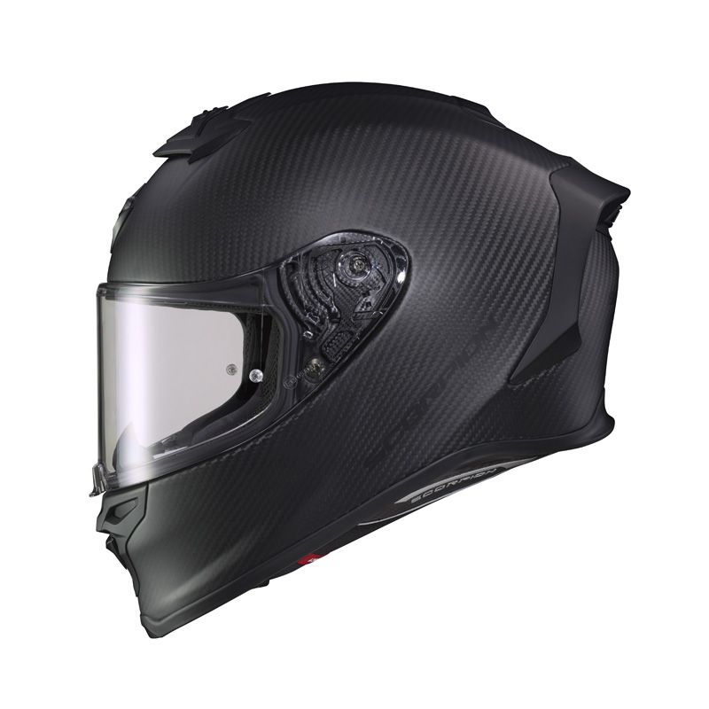 Scorpion EXO-R1 Air Carbon full-face motorcycle helmet in matte black carbon fiber, shown from the side with a clear visor, aerodynamic rear spoiler, advanced ventilation, and ultra-lightweight carbon fiber shell. Premium DOT and ECE certified sport bike helmet designed for high-performance street and track riding. 