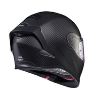 Rear angled view of the Scorpion EXO-R1 Air Carbon full-face motorcycle helmet in matte black carbon fiber with an aerodynamic race-inspired rear spoiler, advanced ventilation, clear visor, and ultra-lightweight carbon fiber shell. Premium DOT and ECE certified sport bike helmet designed for maximum performance on the street and track.