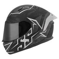 A full-face motorcycle helmet with a black and red color scheme and a clear visor.