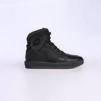 A pair of black motorcycle riding boots with a lace-up closure and a rubber sole.