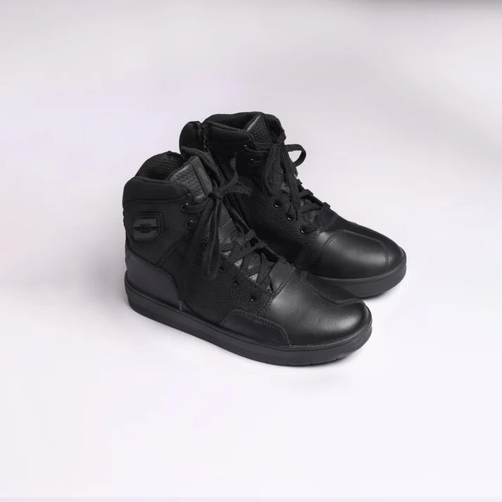 A pair of black high-top motorcycle riding shoes with lace closure and rubber sole.