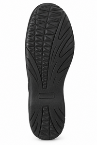 A close-up view of a black rubber shoe sole with detailed tread patterns, shown against a plain white background.