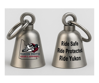 Two metal guardian bells with "Yukon Moto Gear & Apparel" Logo on one side and text on the other on a white background