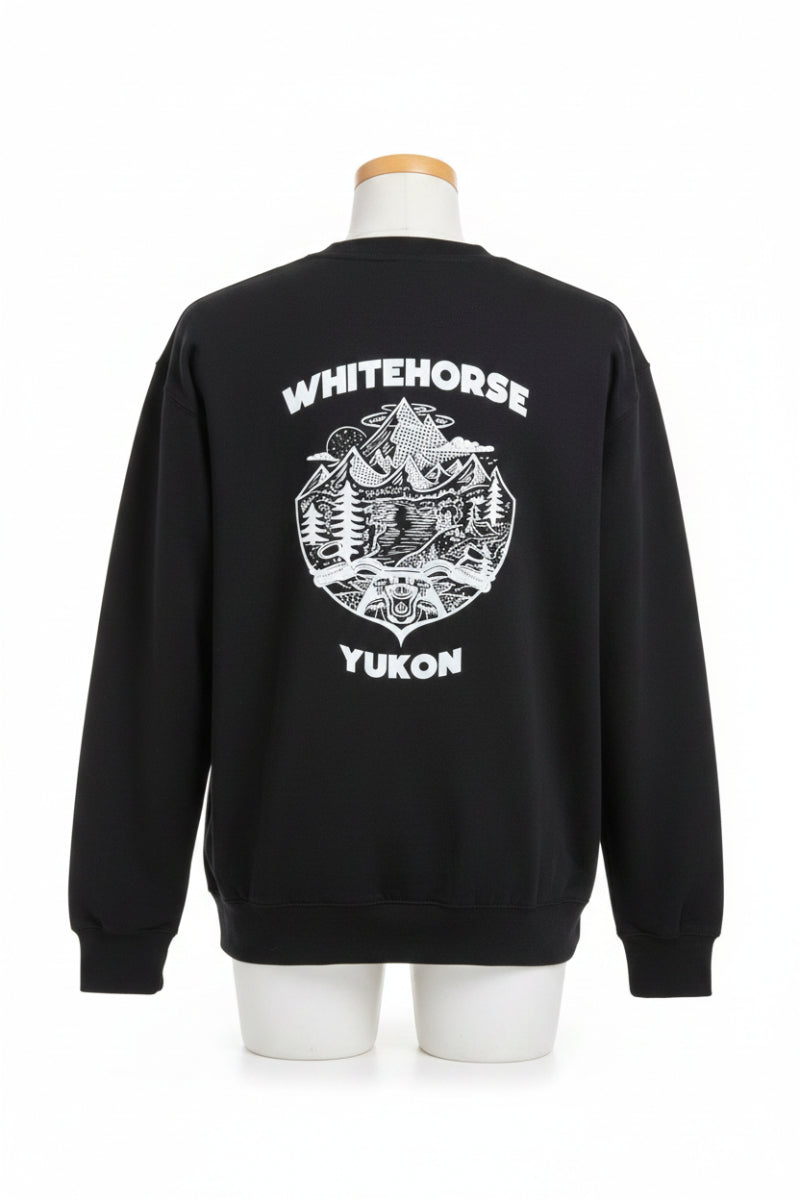 Black hoodie with 'Whitehorse Yukon' graphic on a chair