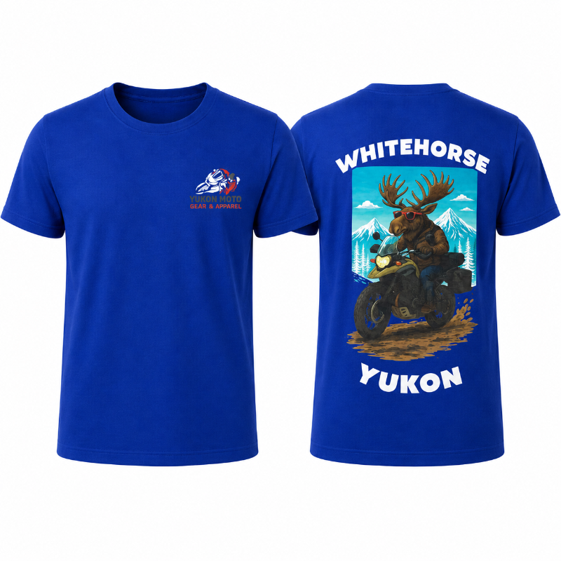 Front and back of a royal-blue YMGA Whitehorse Yukon T-shirt featuring a moose in sunglasses riding an adventure motorcycle through mountain terrain.