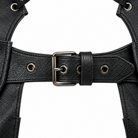 Close-up of the front adjustable belt buckle on YMGA black leather motorcycle chaps, showing the metal buckle, adjustment eyelets and textured leather.