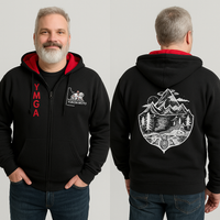Man wearing a Yukon Moto Gear & Apparel branded black hoodie with red interior, front and back designs, on a light gray background.