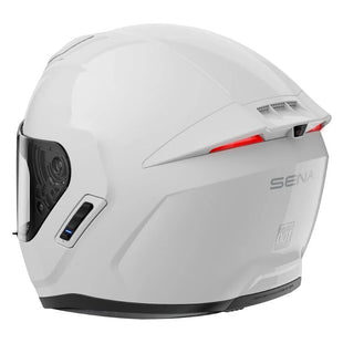 A glossy white full-face motorcycle helmet with integrated visor and speakers, designed for intercom communication.